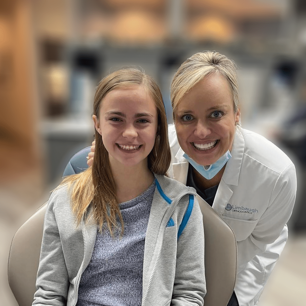 Dr. Lindsay Limbaugh with a smiling patient at the Huntsville office