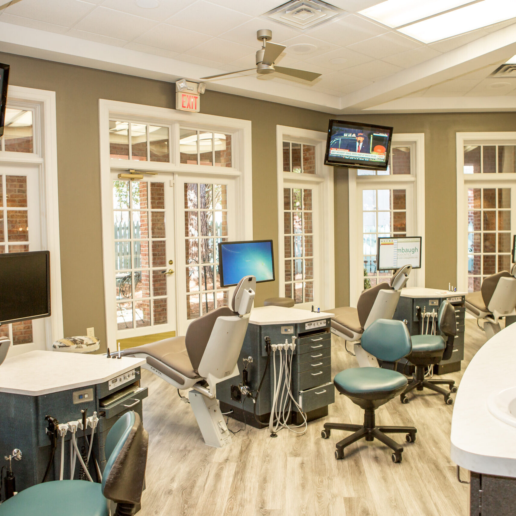 Open treatment bay with orthodontic chairs at Limbaugh Orthodontics